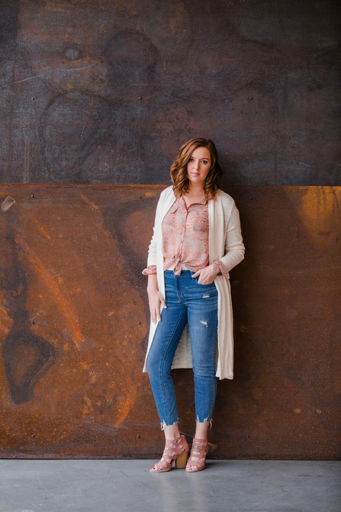 Woman Modeling Cardigan With Jeans and Leather Sandals For Frock Boutique Asheville NC